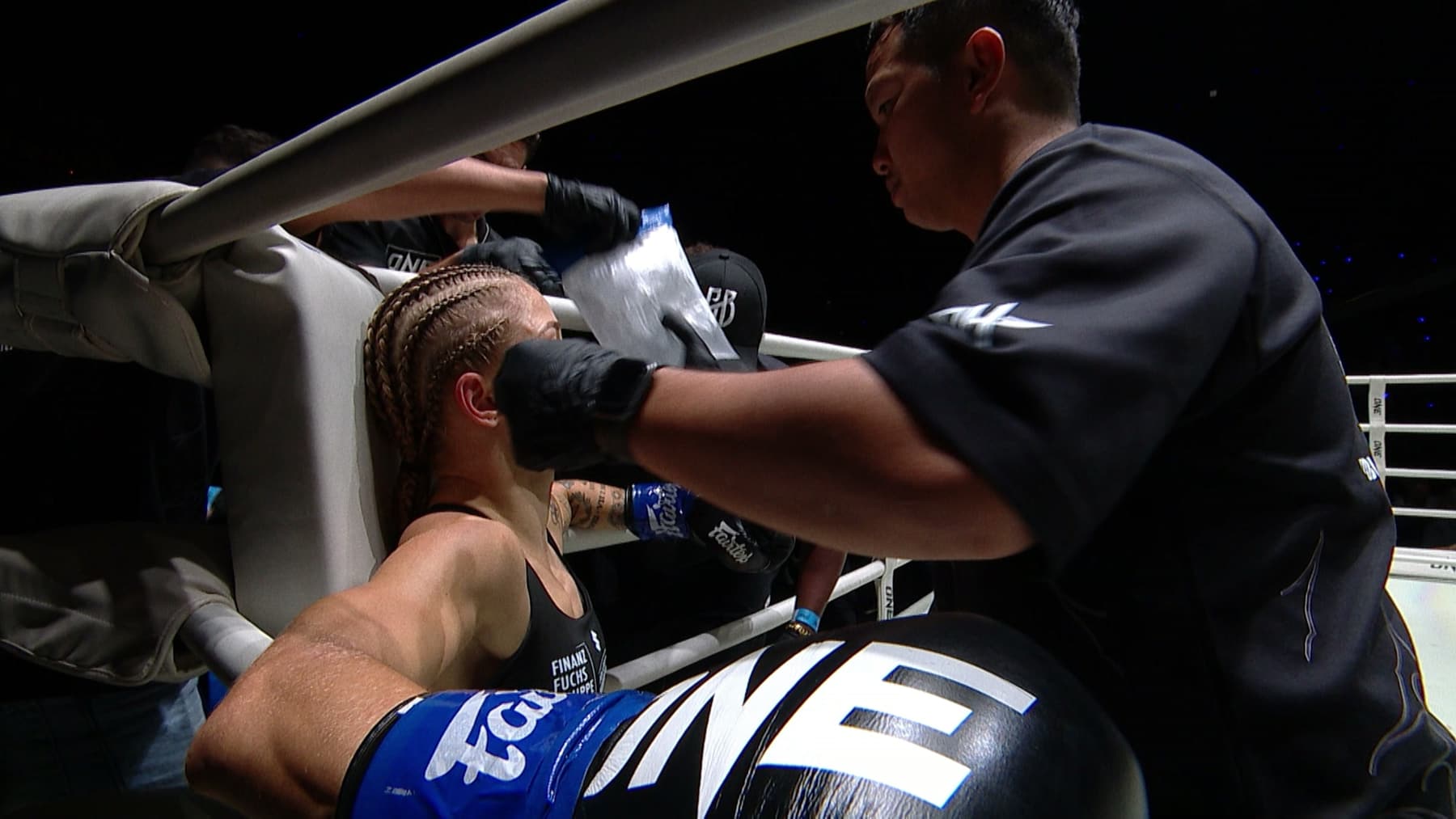 Stella Hemetsberger with her team after the fight